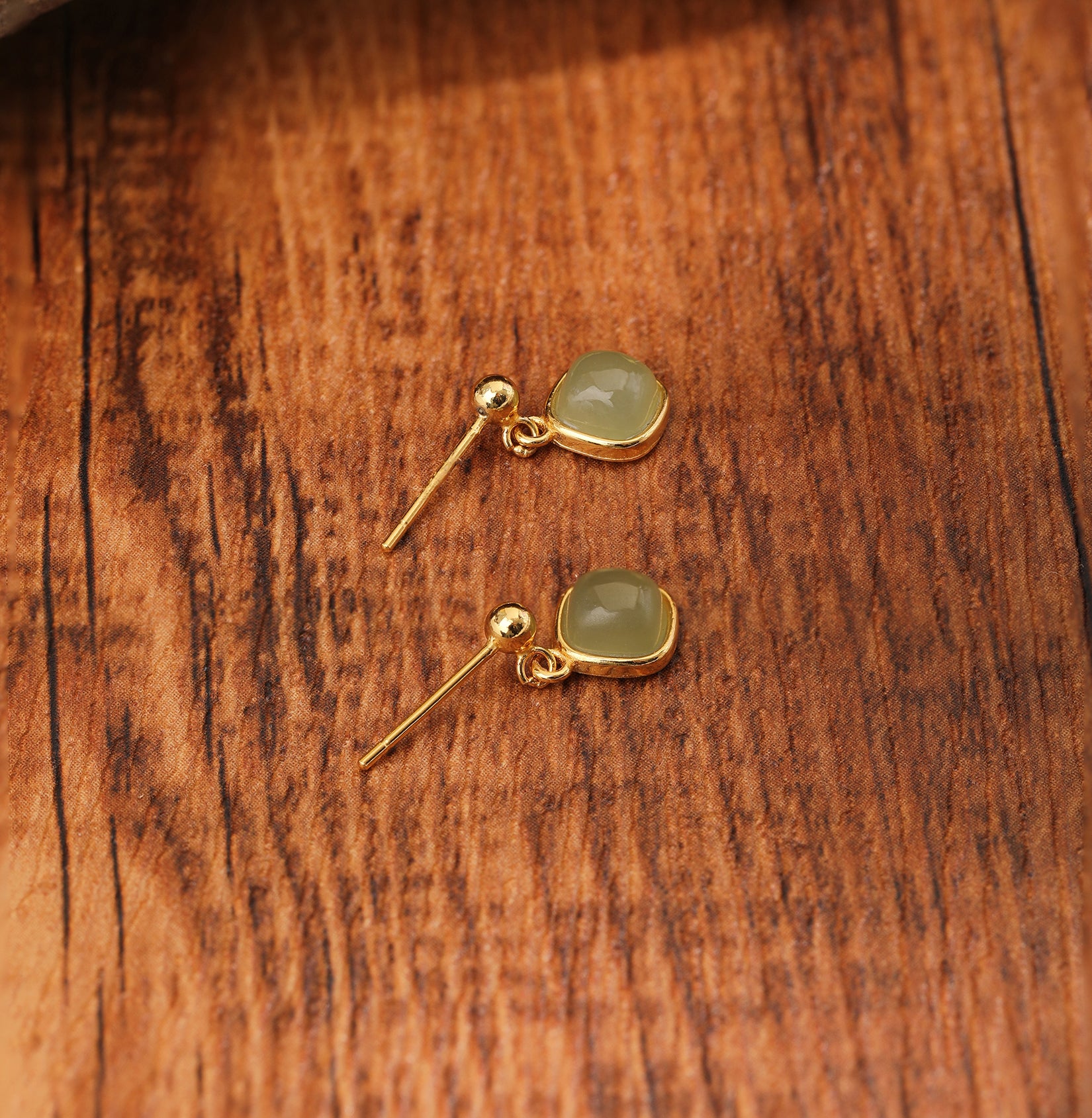 Rhombus-shaped gold-inlaid Hetian Jade earrings